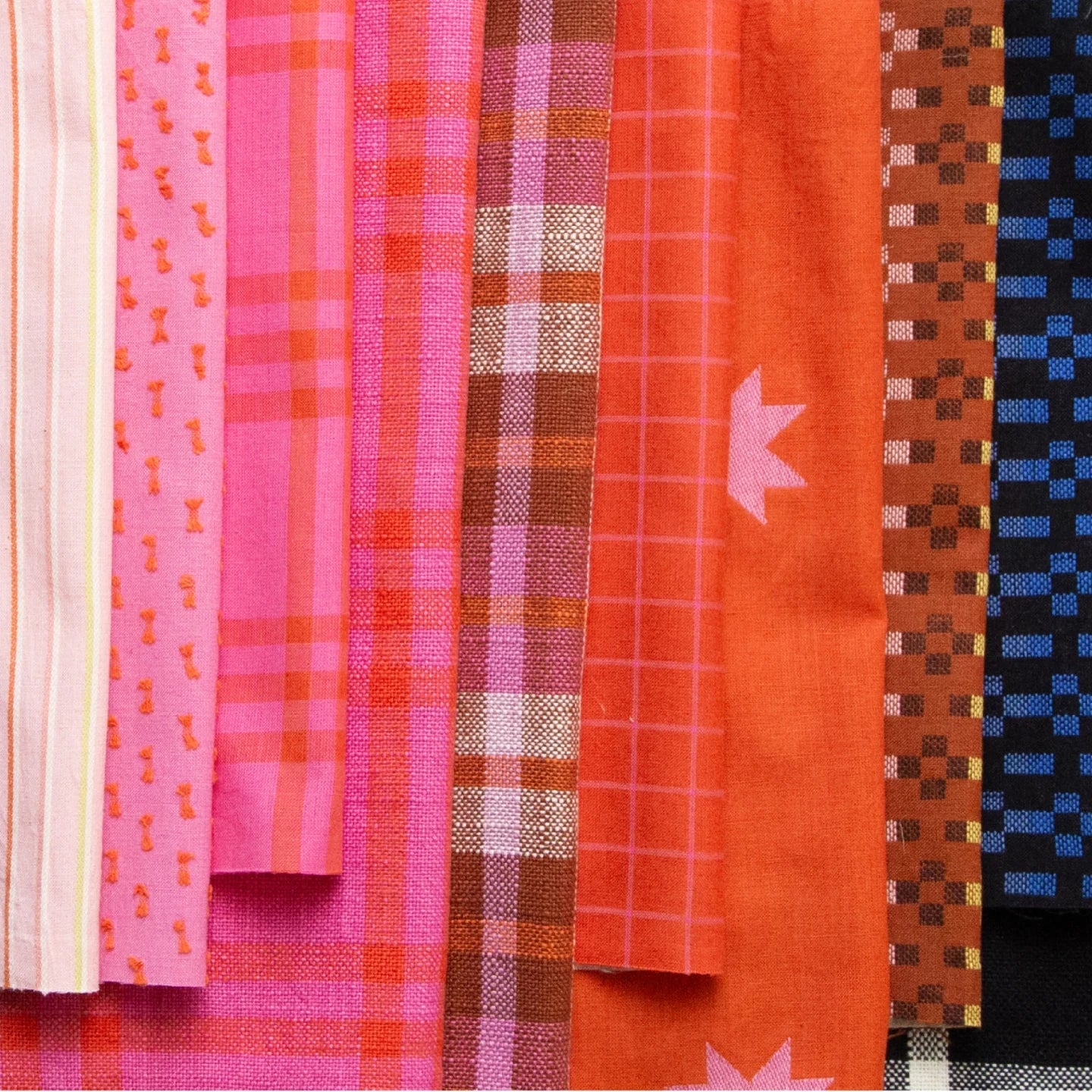 Collection of colorful fabric swatches with various patterns on a white background Warp & Weft Mystic Fable Yarn Dyed Woven Fabrics by Alexia Marcelle Abegg for Ruby Star Society for Moda Fabrics