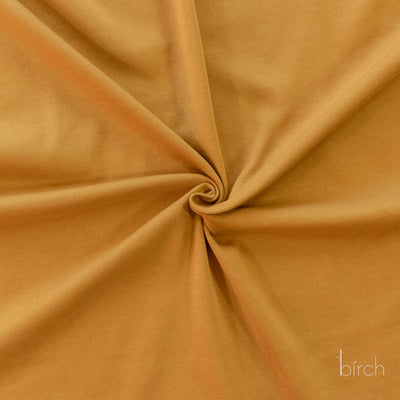 Ochre Solid Interlock Knit by Birch Organic