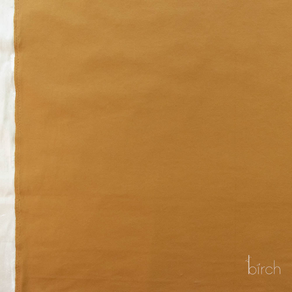 Ochre Solid Interlock Knit by Birch Organic