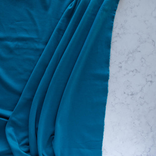 Abyss Solid Interlock Knit by Birch Organic
